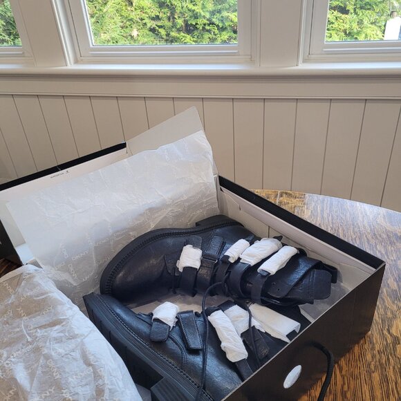 DKNY Buckled Straps Accent Combat Boots. Black Leather and Silver-Tone Metal. 7. - Picture 11 of 11